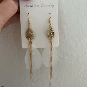 Long feathered earrings